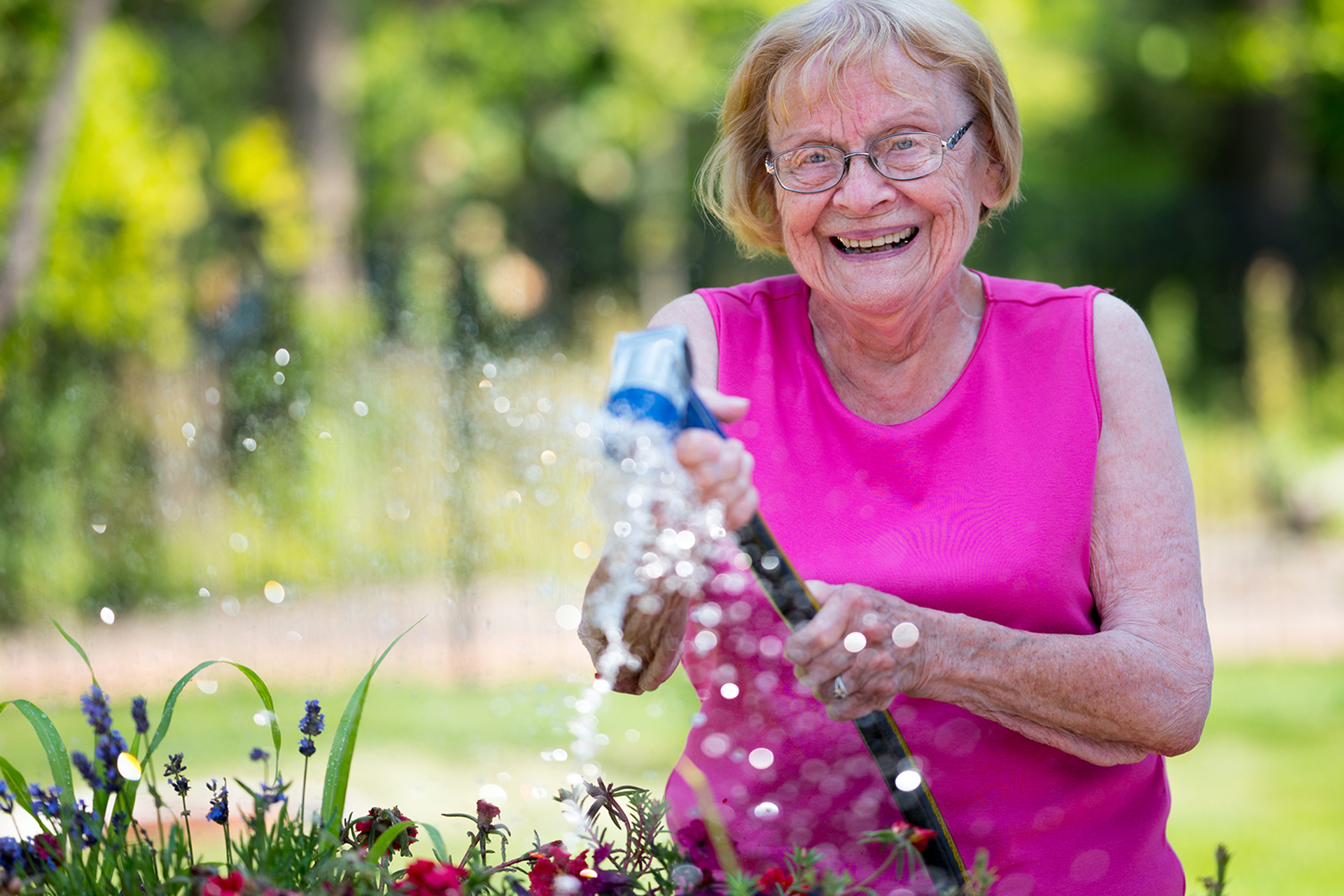 Resident Watering Flowers