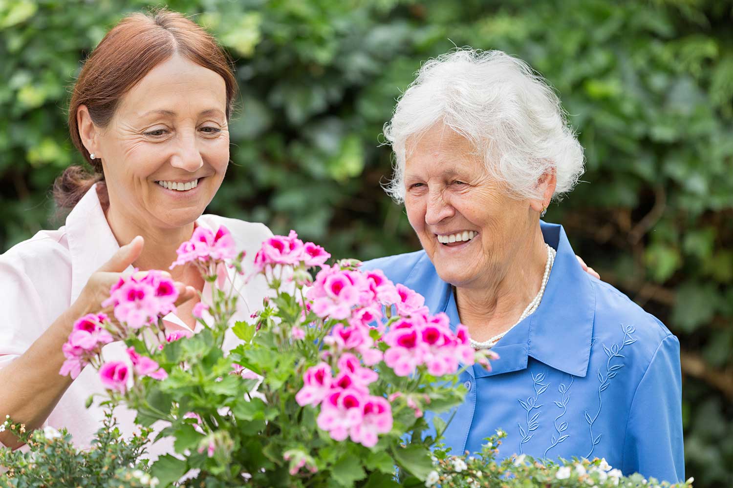 mother and daughter gardening together